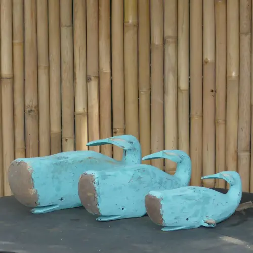 Product image of the product “Whale, wood in turquise. Set of 3; Size L: 48x20x22cm H, Size M:38x18x18cm H, Size S: 30x12x13cm H. ”